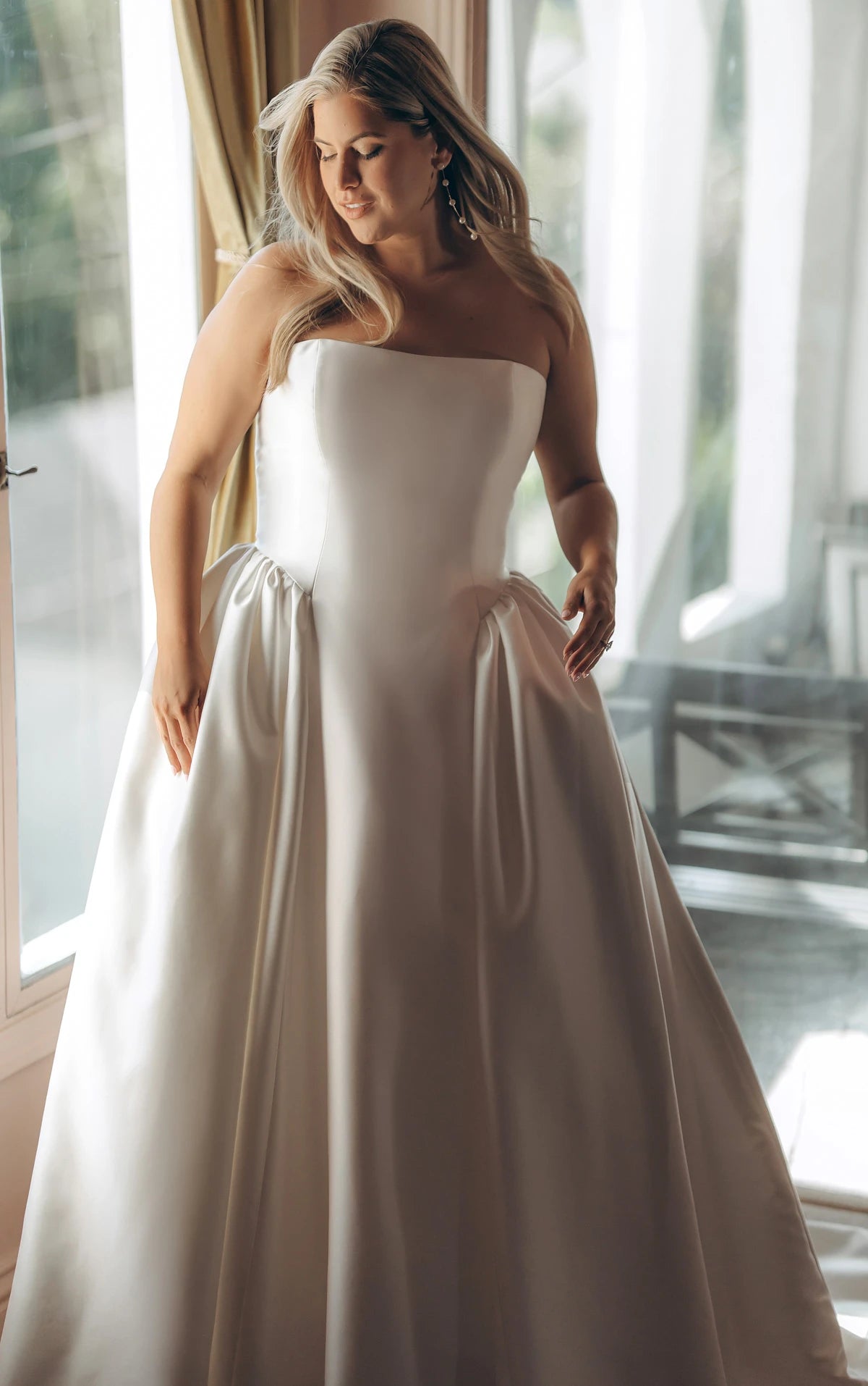 Strapless Mikado A-Line Wedding Gown with Architectural Seaming and Pockets Stella York SY8274